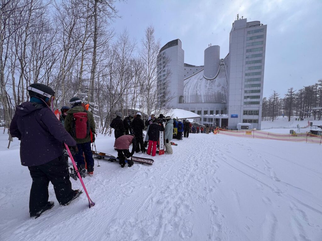 Morning line at the Niseko Village gondola at the Hilton hotel in Niseko Village, February 2025