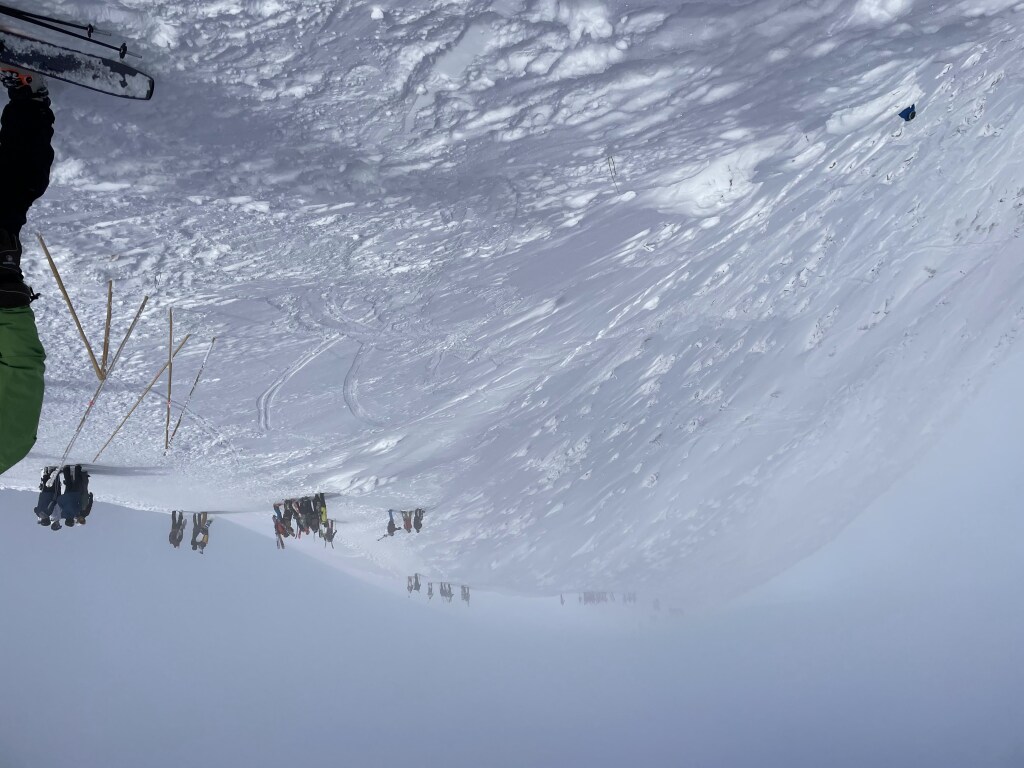 Lots of people hiking up to the summit of Niseko's Annupuri Mountain, February 2025