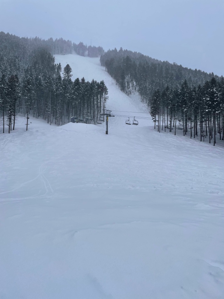 Top of the Rafferty lift looking up at the very steep Yeti run at Snow King, March 2025