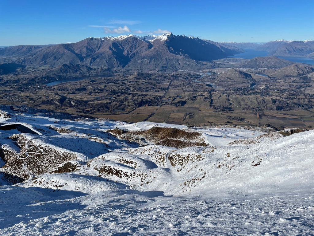 View over to The Remarkables ski resort from the Coronet Peak upper mountain, August 2025
