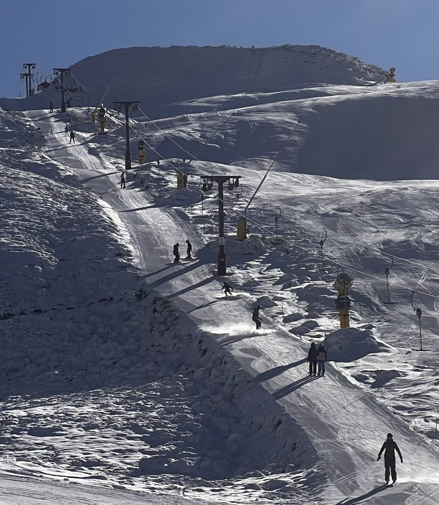 The Rocky Gully T-Bar was having issues the first time we skied down there.  We had to hike out to the Coronet Peak Express to continue our ski day, August 2025
